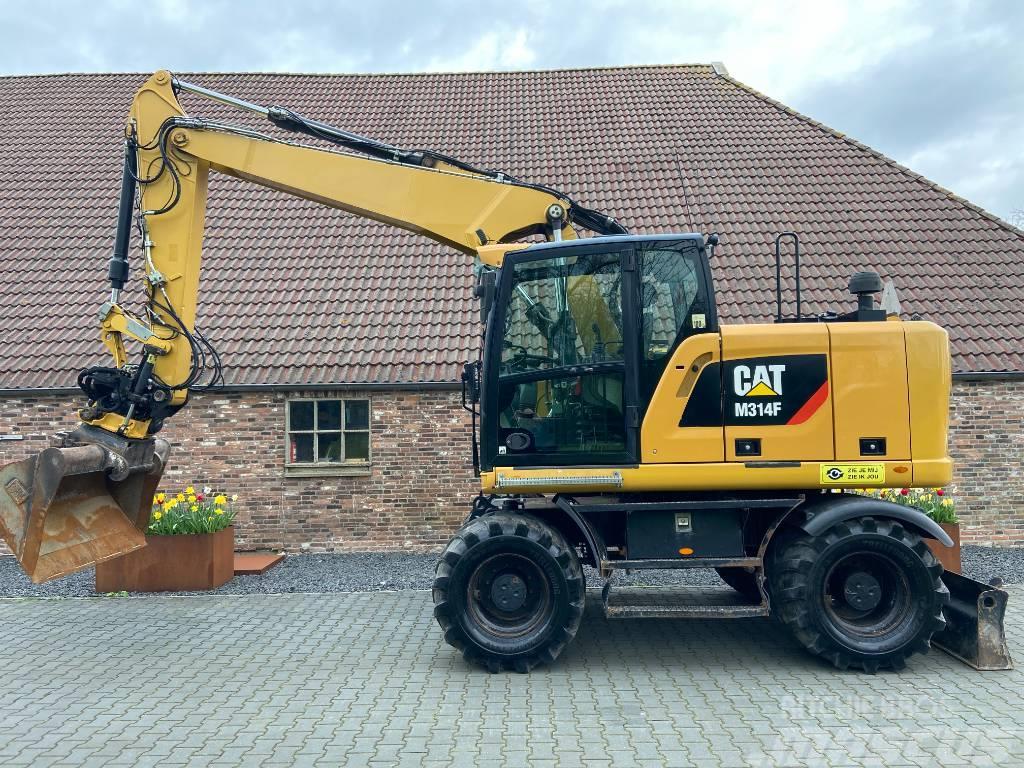 CAT M314F inclusief Engcon EC214 Wheeled excavators
