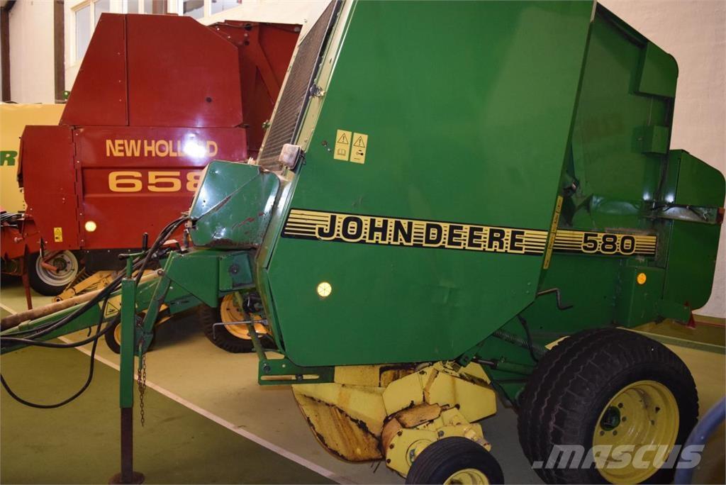 John Deere 580 Ronde-balenpersen