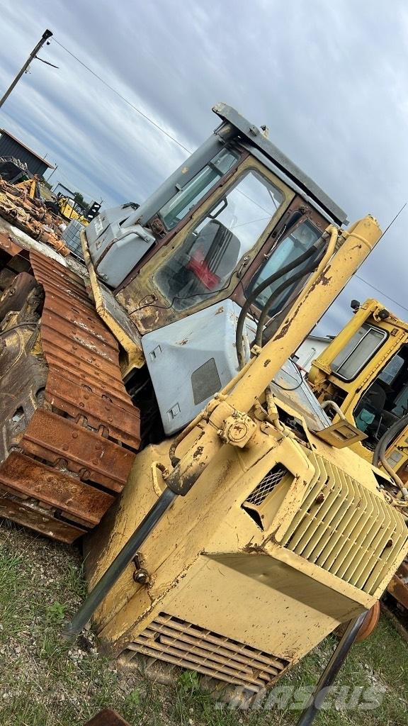 Komatsu D65 EX Rupsbanden, kettingen en onderstel