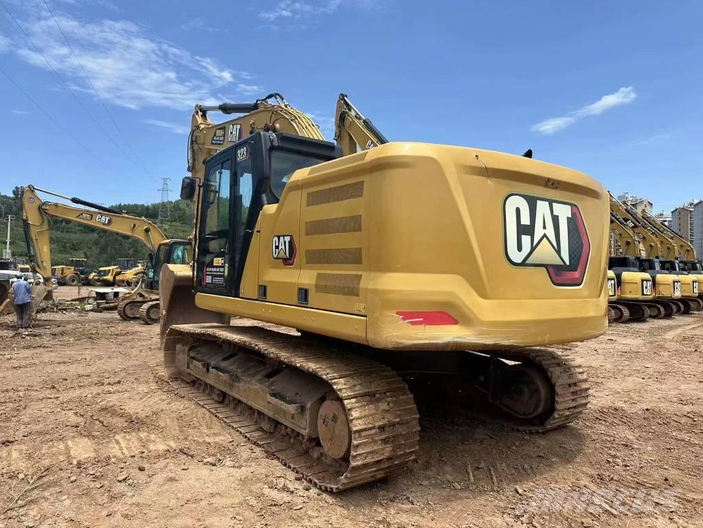 CAT 323 Rupsgraafmachines
