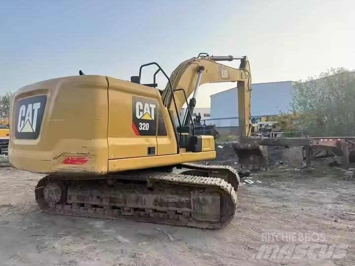 CAT CAT323GX Rupsgraafmachines