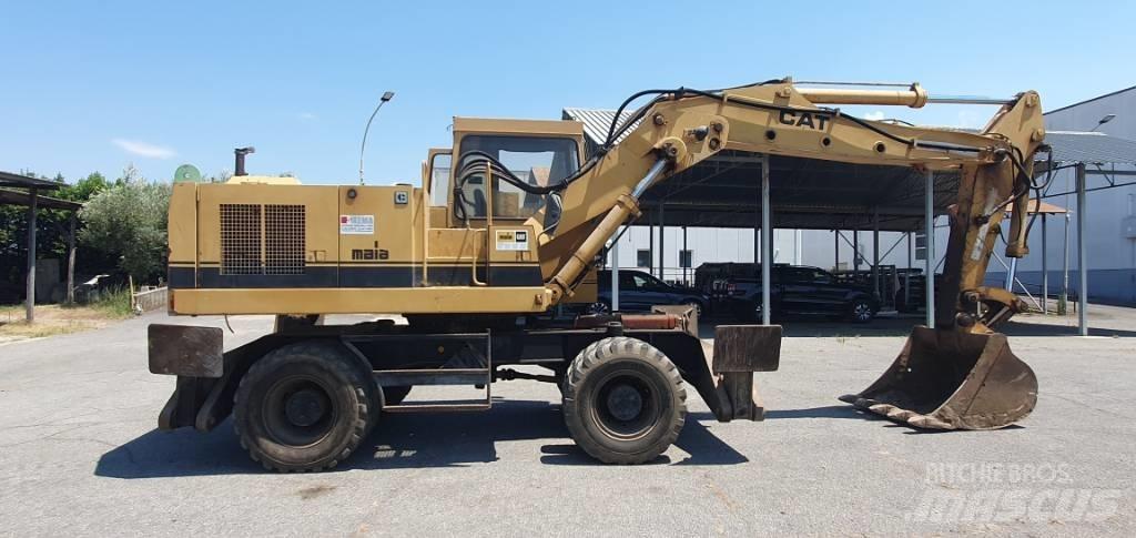 CAT 214 B Wielgraafmachines