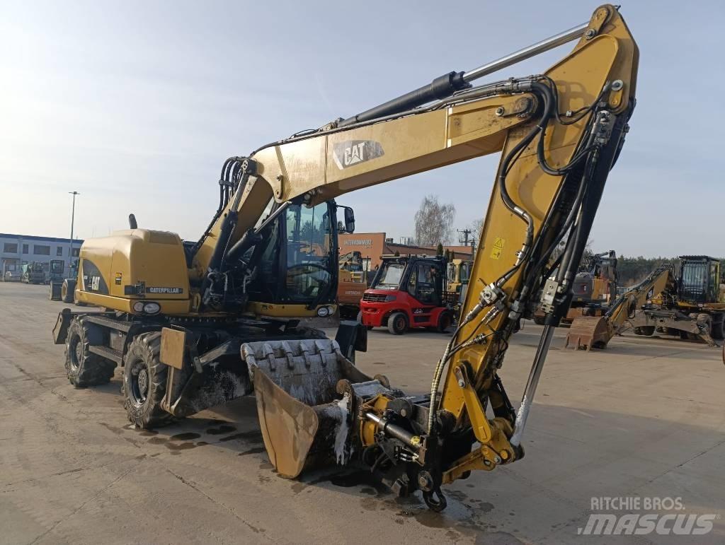 CAT M 313 D Wielgraafmachines