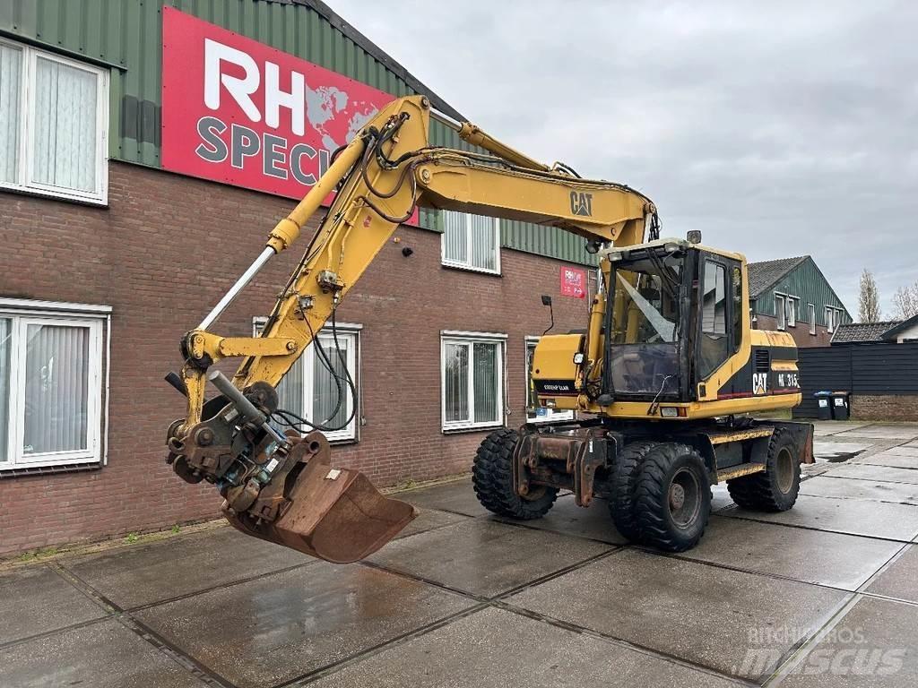 CAT M315 +ROTO CE Wielgraafmachines