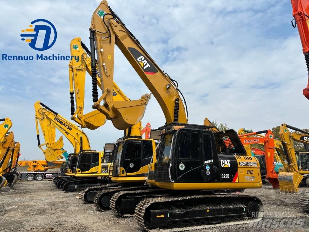 CAT 323 Rupsgraafmachines
