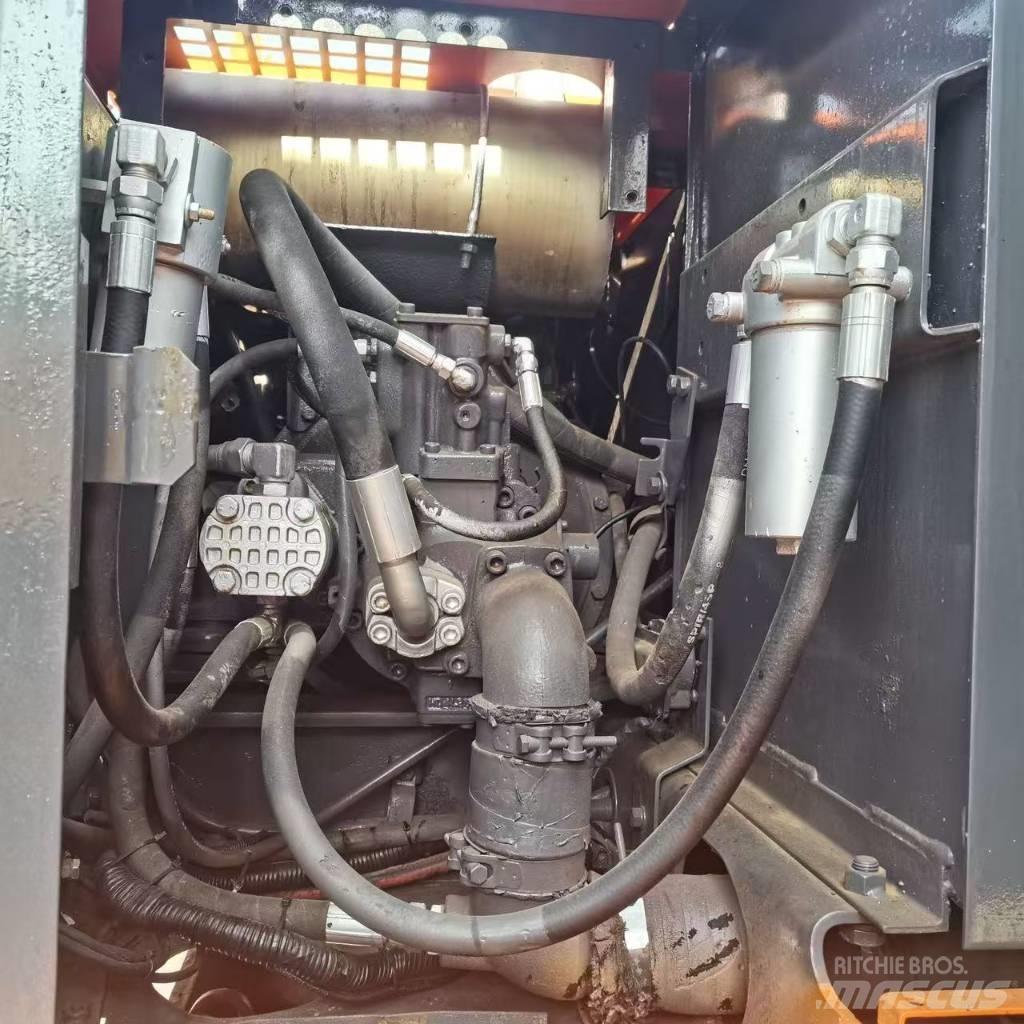 Hitachi EX 100 W D Wielgraafmachines