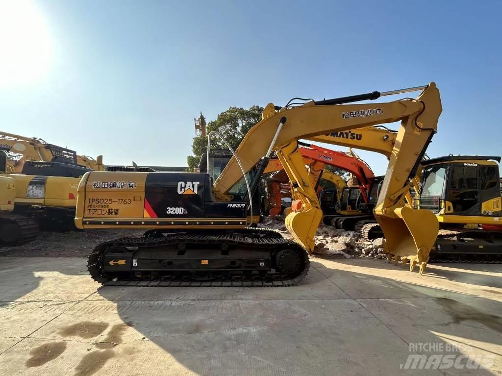 CAT 320D2 Rupsgraafmachines