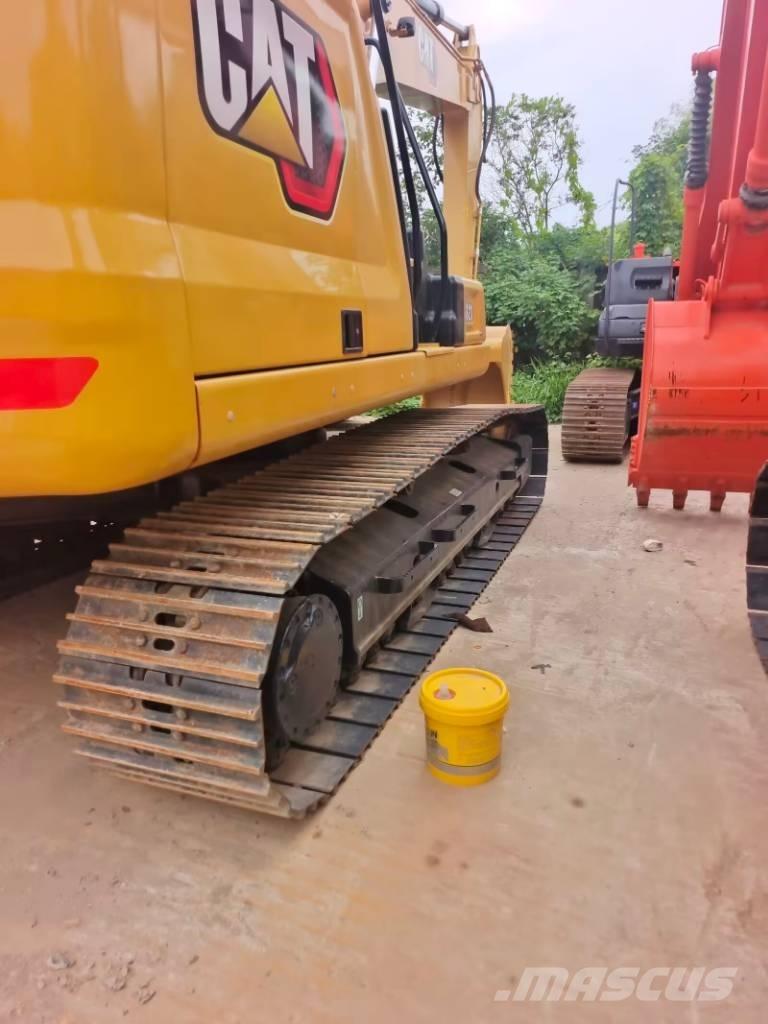 CAT 323  GC Rupsgraafmachines
