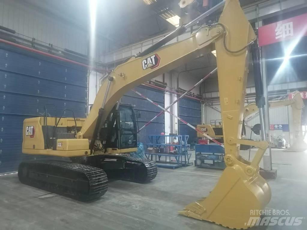 CAT 323 Rupsgraafmachines