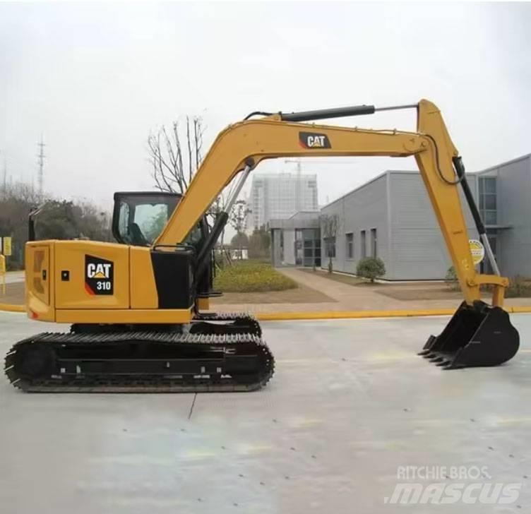 CAT 310 Rupsgraafmachines
