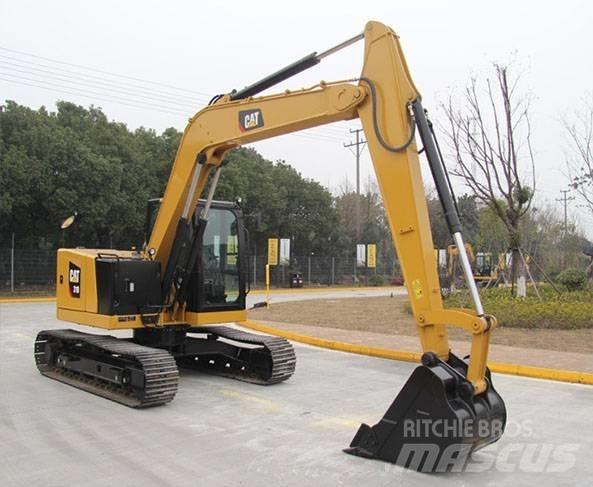 CAT 310 Rupsgraafmachines