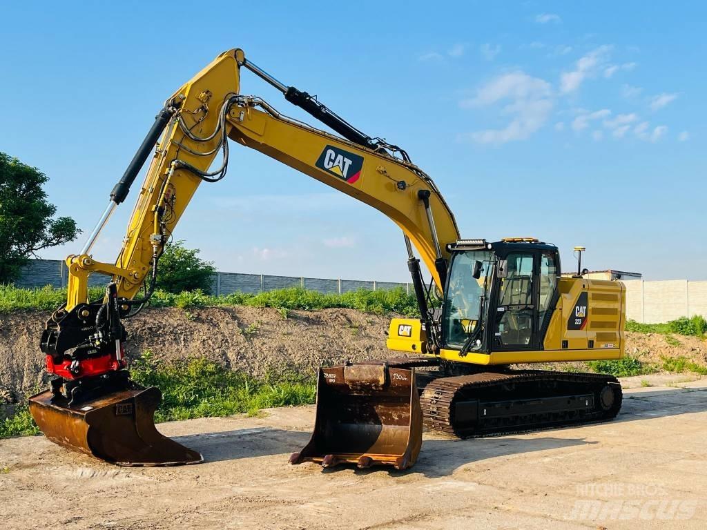 CAT 323 Rupsgraafmachines