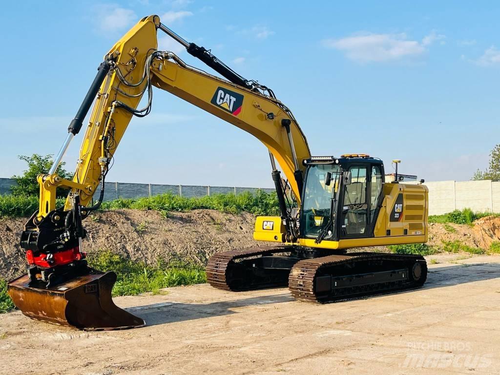 CAT 323 Rupsgraafmachines