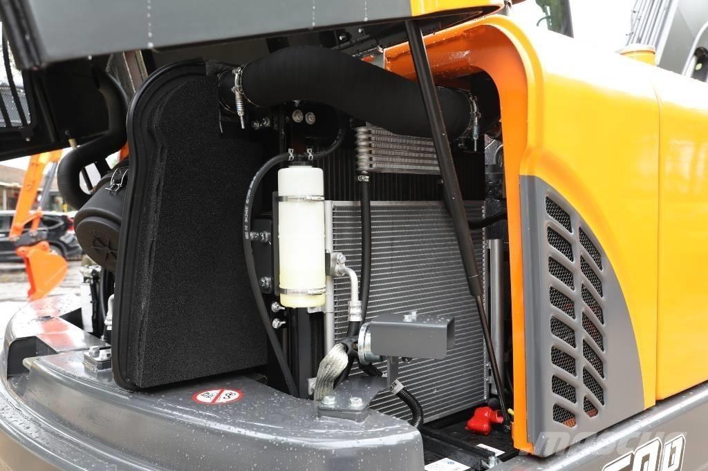 Develon DX 60 D Wielgraafmachines