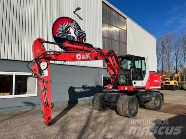 O&K MH 5 Compact Gieken en dippers