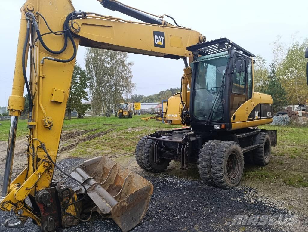 CAT M 318 C Wielgraafmachines