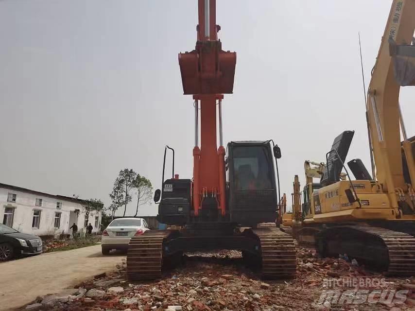 Hitachi ZX 210 Rupsgraafmachines