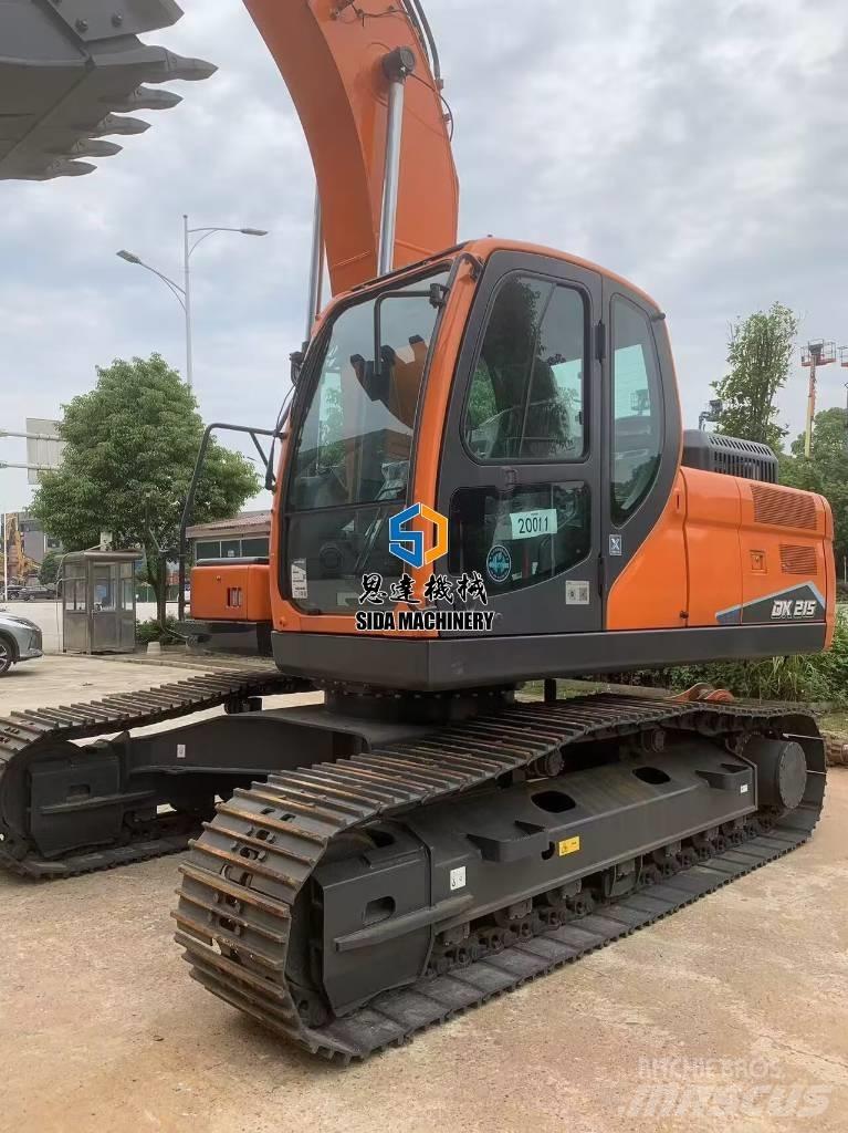 Develon DX 215 Midigraafmachines 7t - 12t