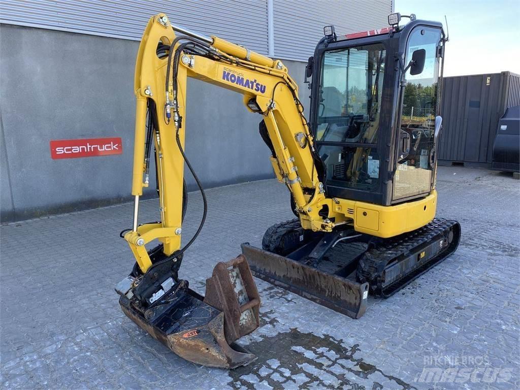 Komatsu PC24MR-5 Wielgraafmachines