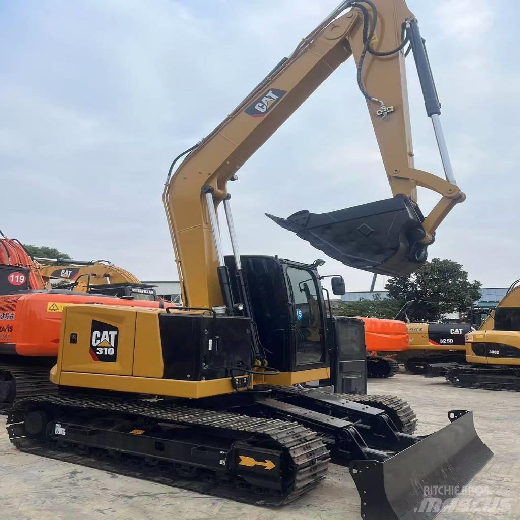 CAT 310 Rupsgraafmachines