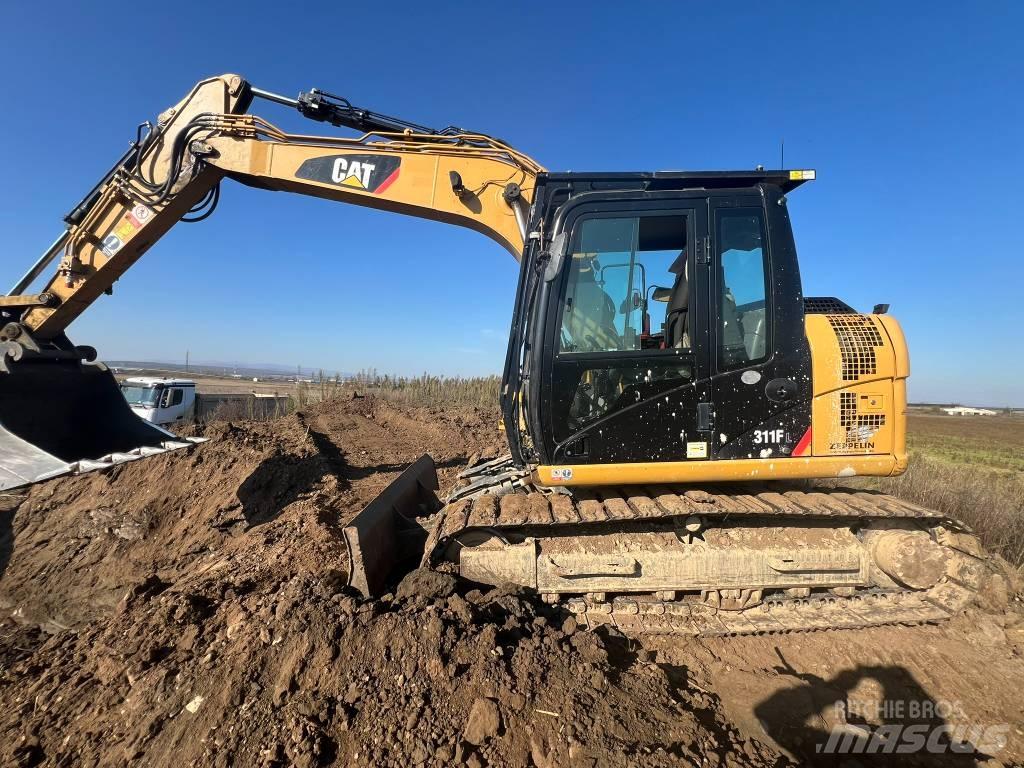 CAT 311 FL Rupsgraafmachines