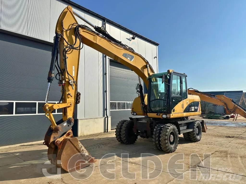 CAT M313D Wielgraafmachines