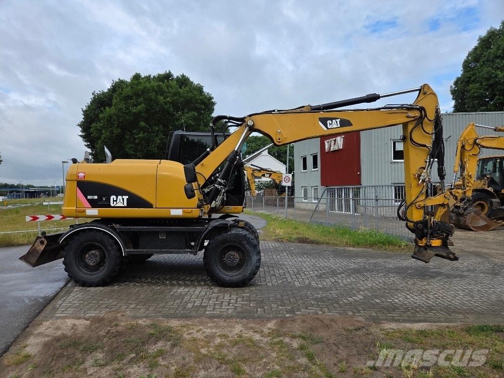 CAT M313D Wielgraafmachines