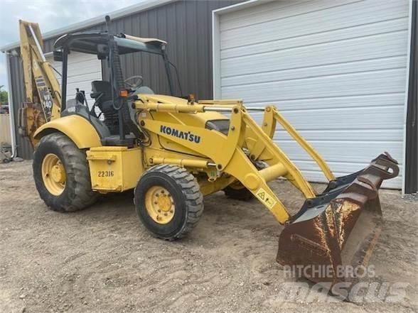 Komatsu WB140 Graaf-laadcombinaties