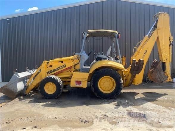 Komatsu WB140 Graaf-laadcombinaties