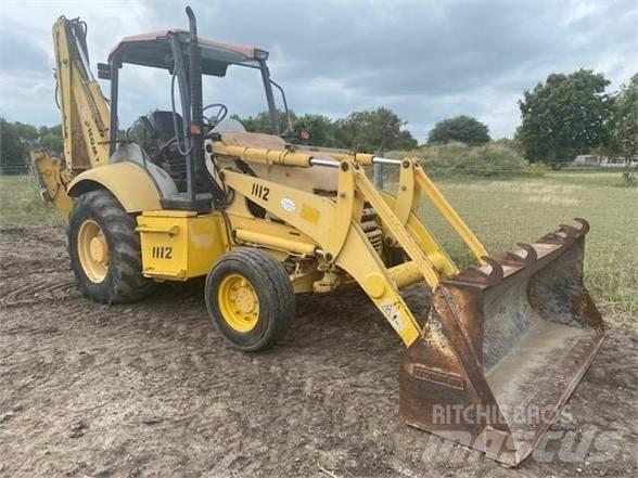 Komatsu WB140 Graaf-laadcombinaties