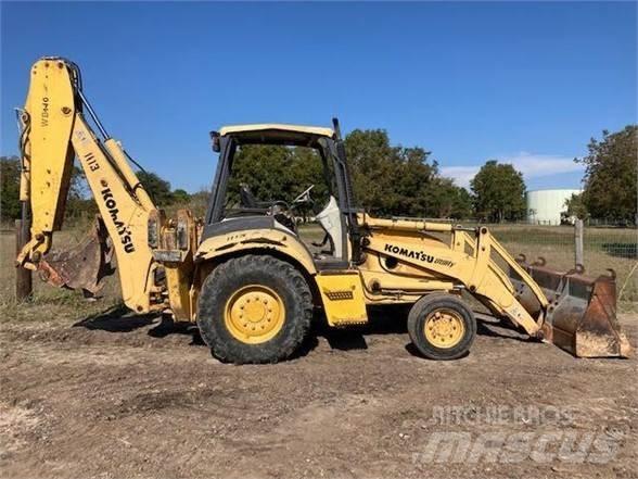 Komatsu WB140 Graaf-laadcombinaties