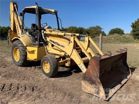 Komatsu WB140 Graaf-laadcombinaties