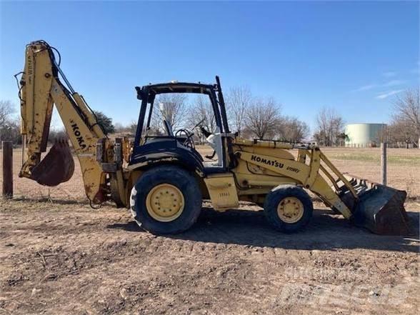 Komatsu WB140 Graaf-laadcombinaties