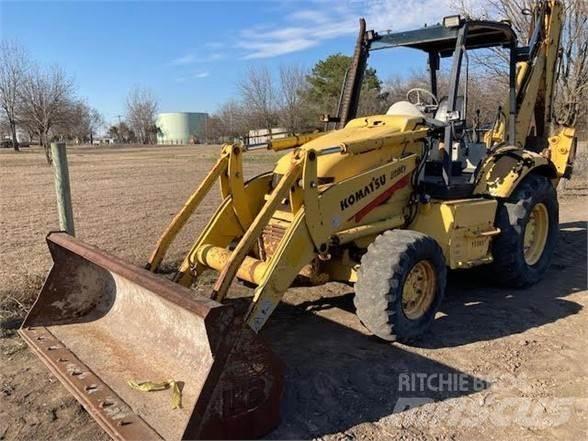 Komatsu WB140 Graaf-laadcombinaties