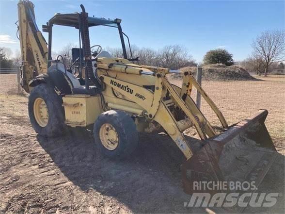 Komatsu WB140 Graaf-laadcombinaties