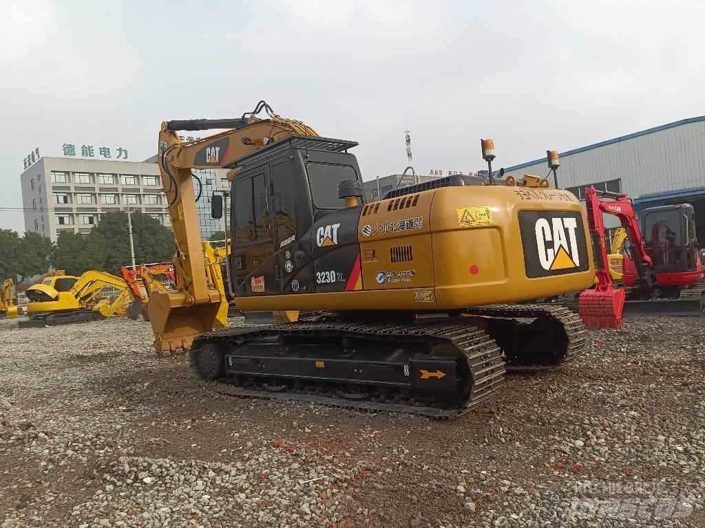 CAT 323 D Rupsgraafmachines