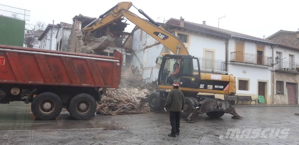 CAT M318d Wielgraafmachines