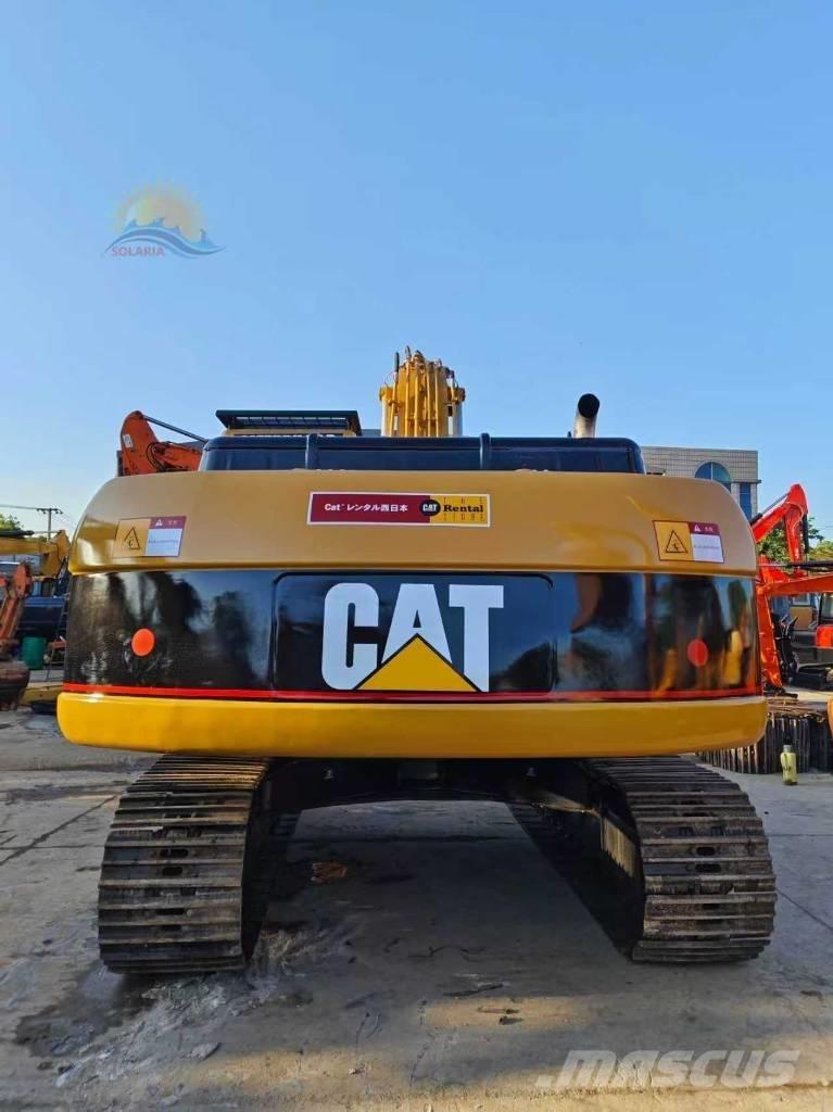 CAT 325 C Rupsgraafmachines