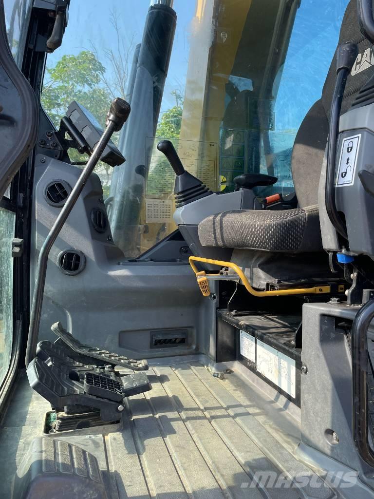 CAT 310 Rupsgraafmachines