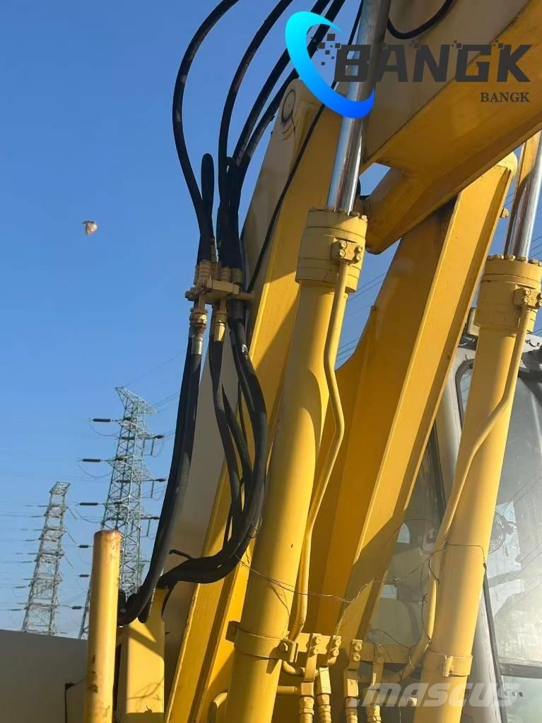  KOMΛ1'SU PW128us Wielgraafmachines