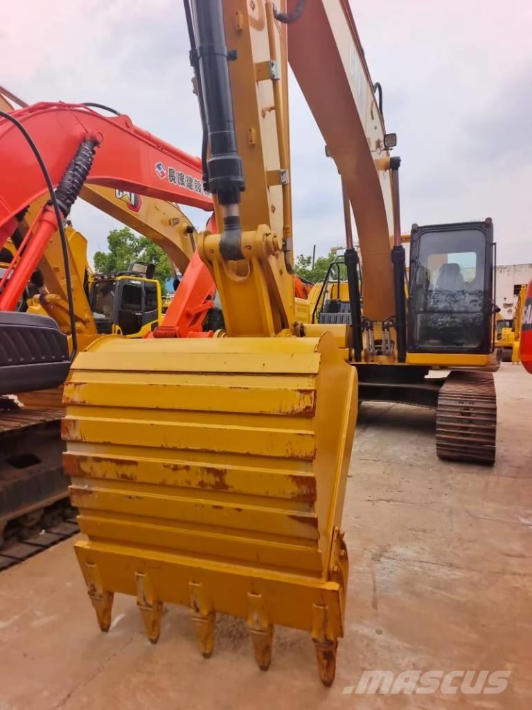 CAT 323 GC Rupsgraafmachines