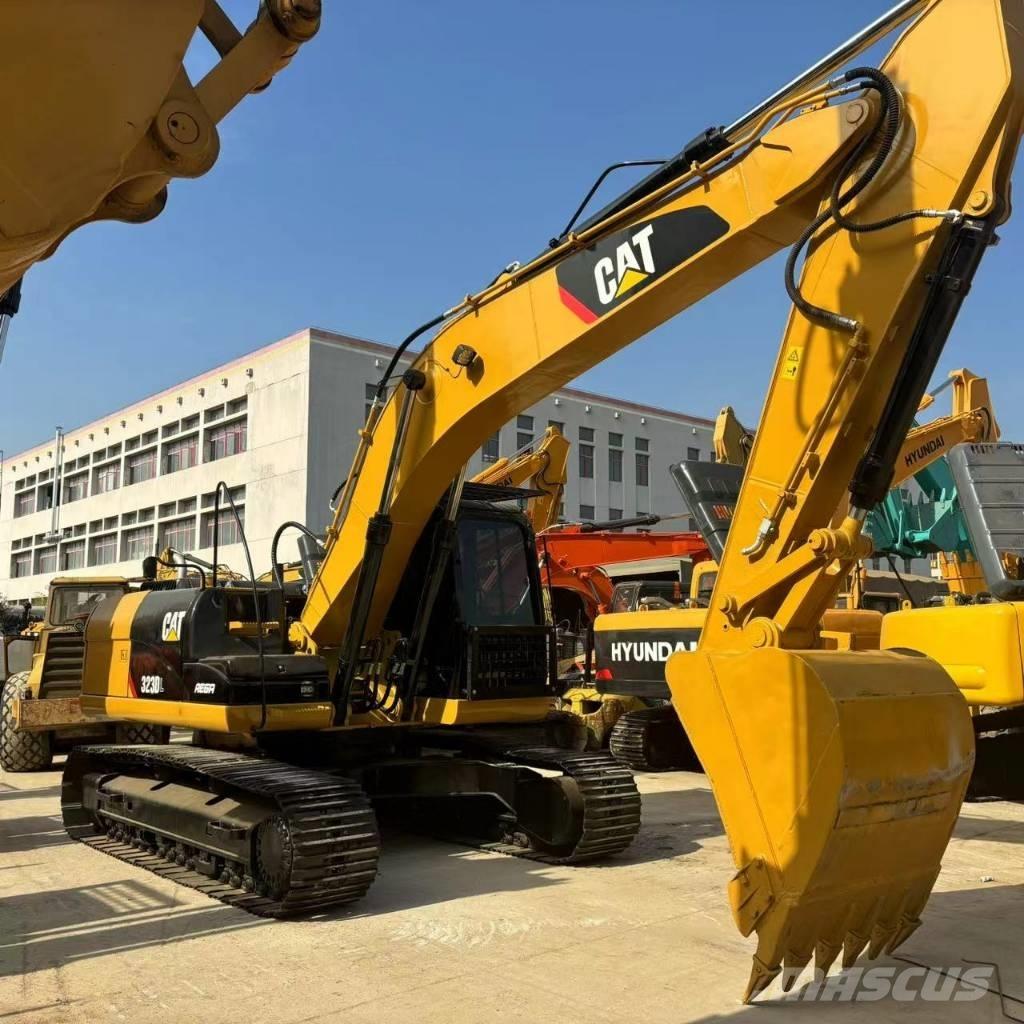 CAT 323 D L Rupsgraafmachines