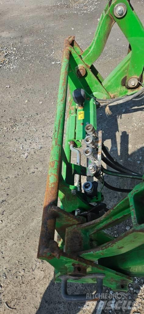 John Deere 6215R Tractoren