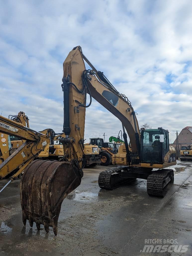 CAT 323 D Rupsgraafmachines