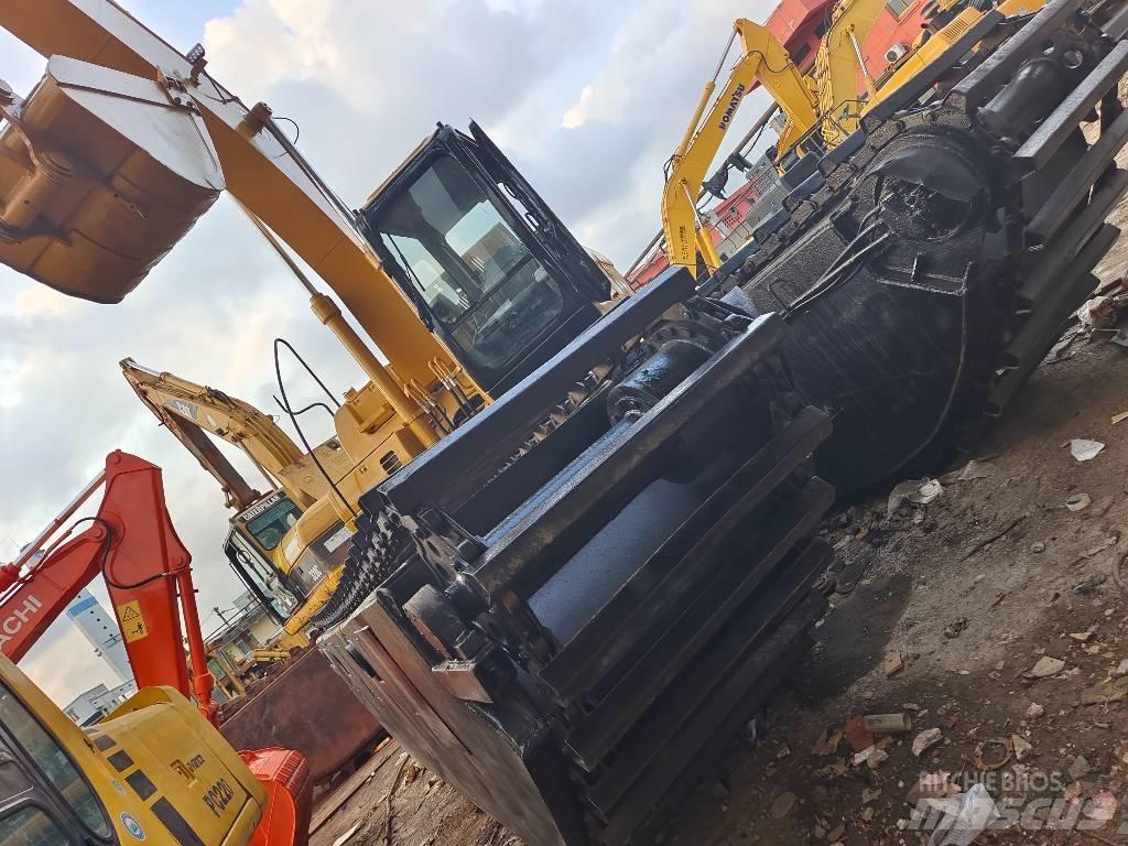 CAT 320 C Amfibische graafmachines