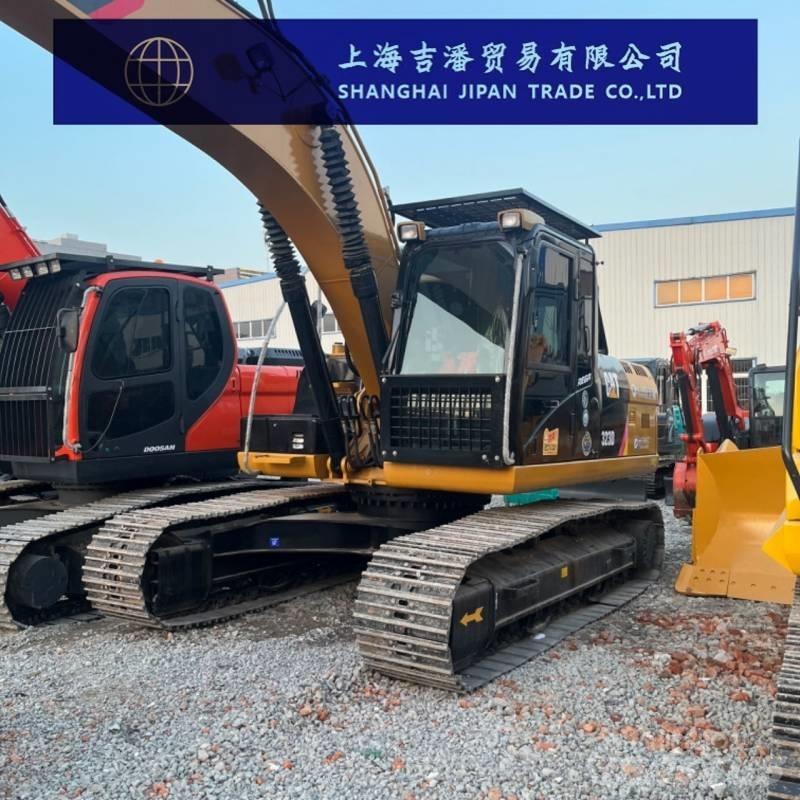CAT 323 D Rupsgraafmachines
