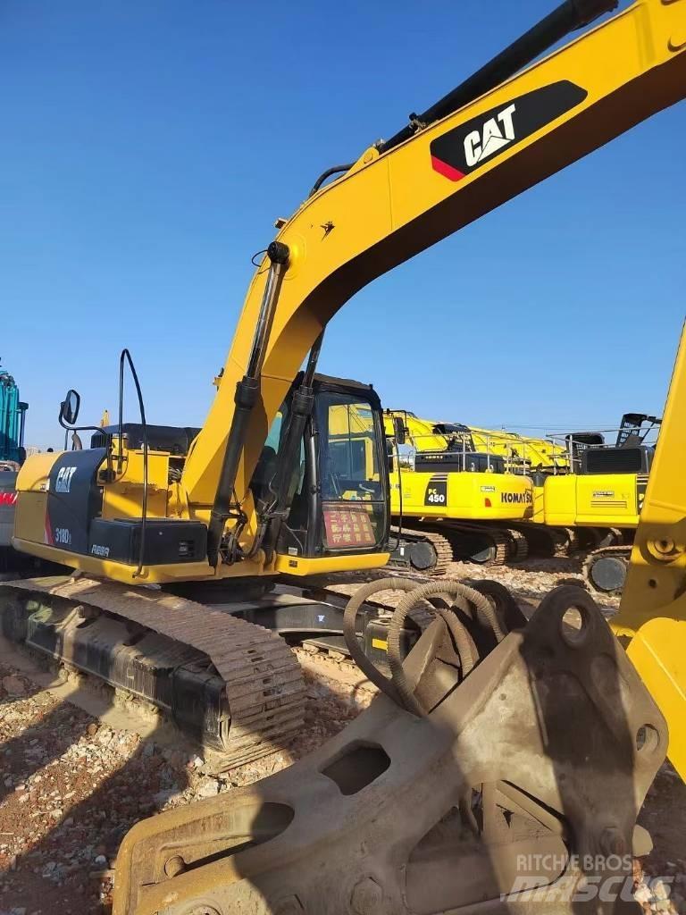 CAT 318 Rupsgraafmachines