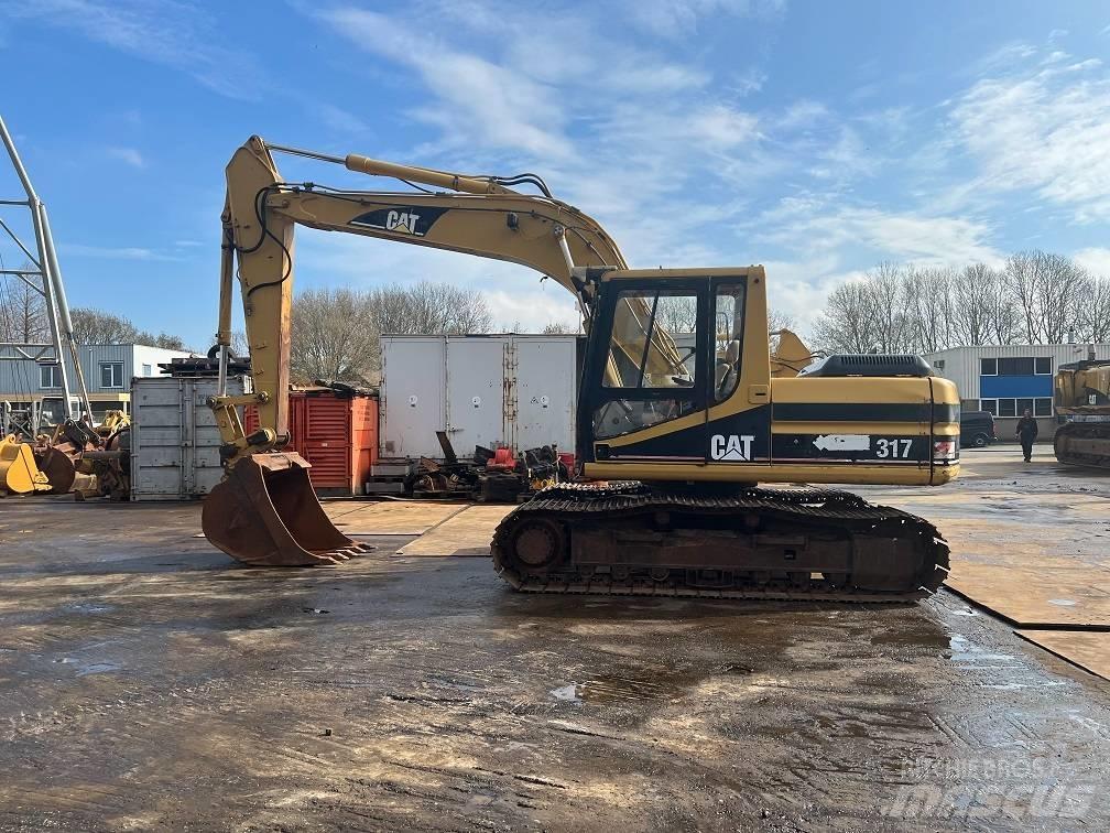 CAT 317 Rupsgraafmachines