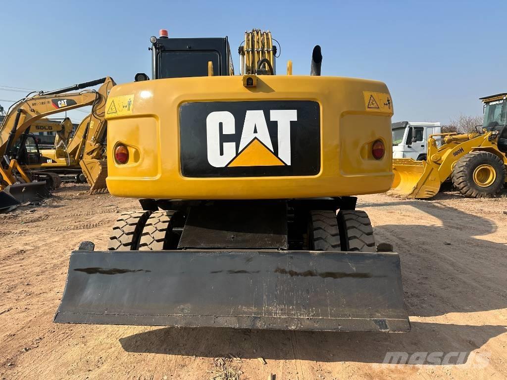 CAT M 320D Wielgraafmachines