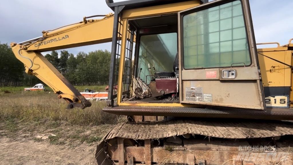 CAT 215 Rupsgraafmachines